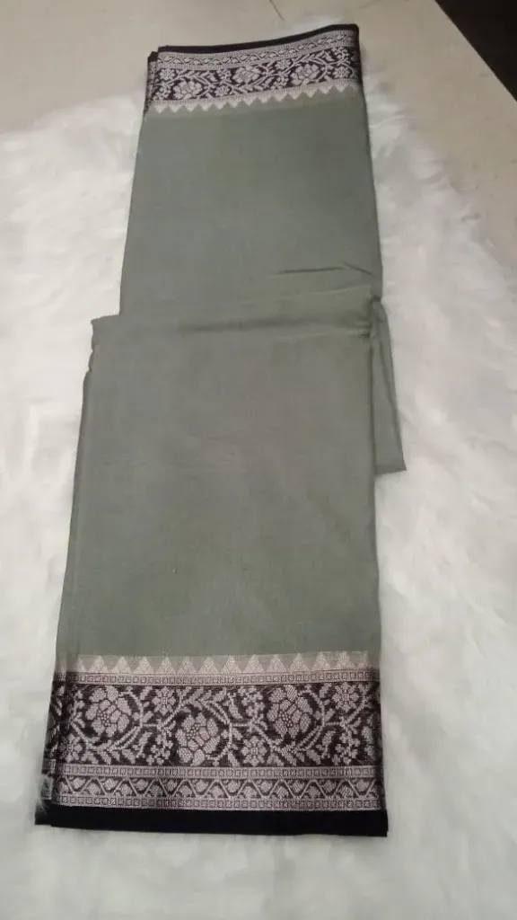 Timeless Varanasi Heritage Warm Silk- algi green with black Border